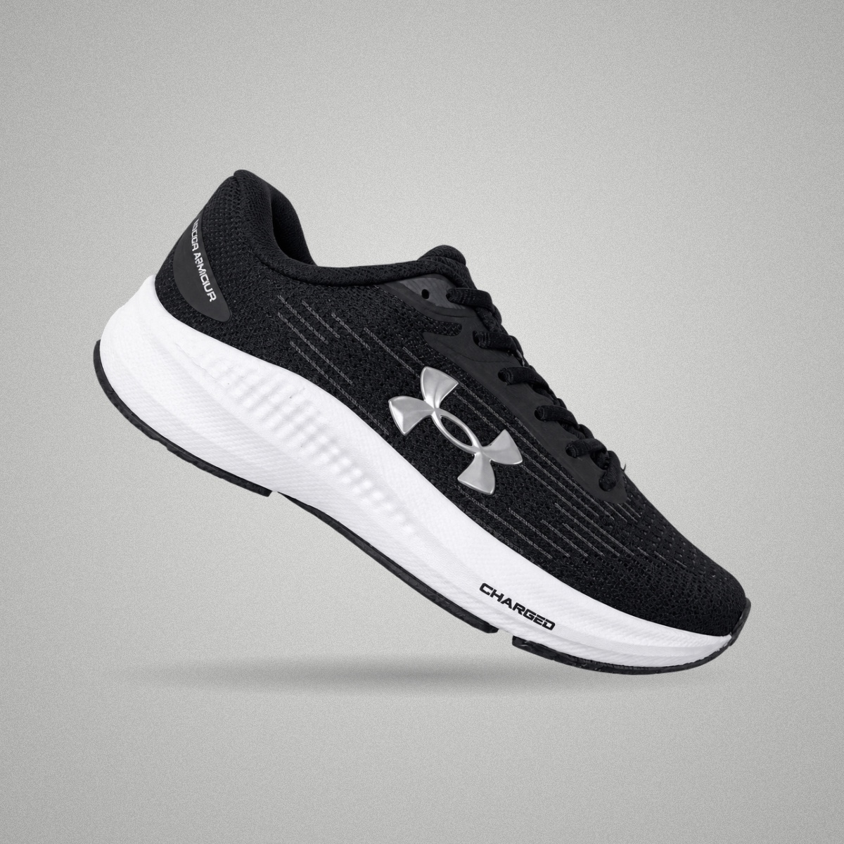 Tênis Under Armour Charged Starlight Preto e branco